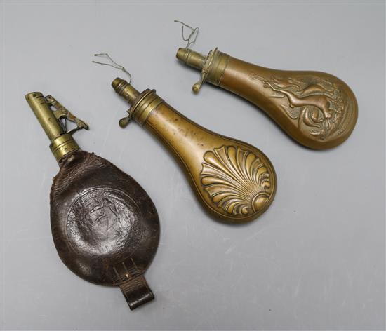 Two 19th century copper shot flasks and another in leather